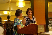 C12-5-30-Jo Anne Martinez Presenting Artistic Sweepstakes ribbon to Pat Shandrow