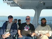 C12-6-16-Jon Dixon, Bob Clark, and Peter Shalit relaxing on the cruise