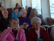C12-6-18-Sally Robinson, M. J. Tyler, and others enjoying the cruise from inside the ship